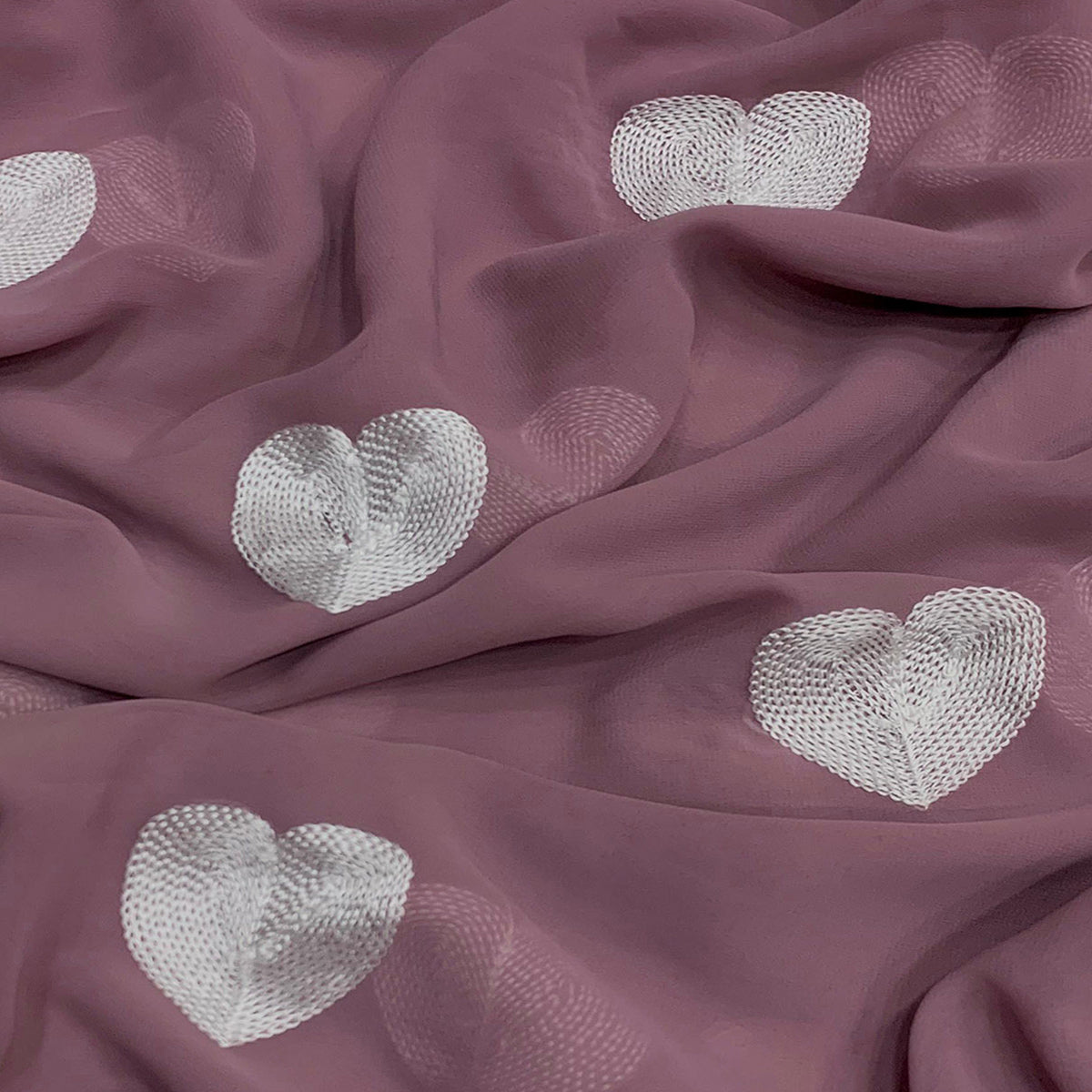 Mauve Embroidered Georgette Saree