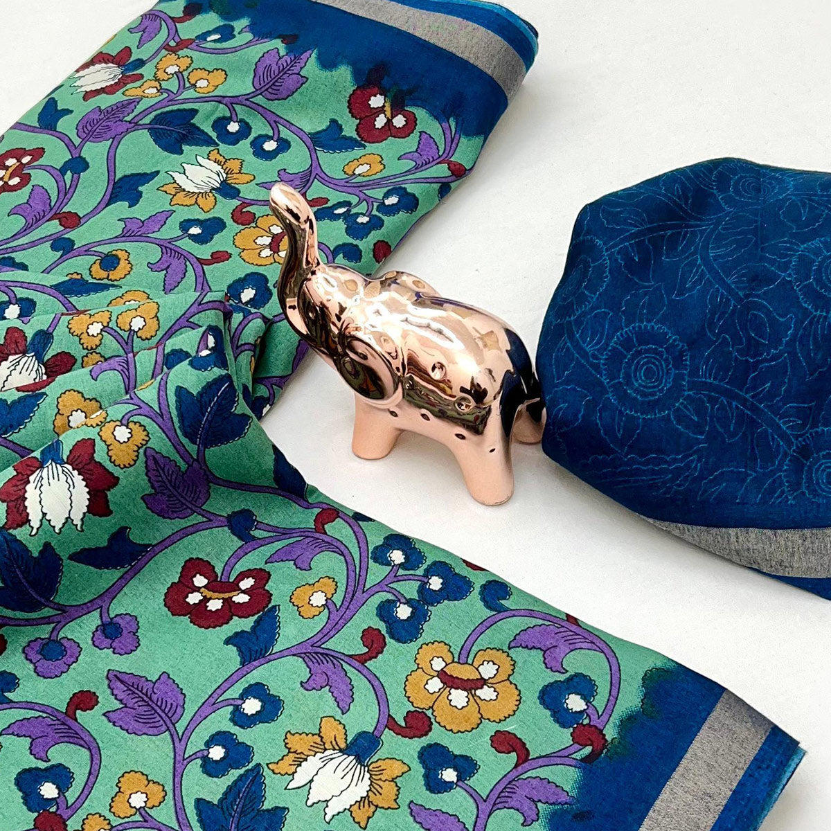 Sea Green Floral Printed Tussar Silk Blend Saree Enhanced With Intricate Zari Border Work