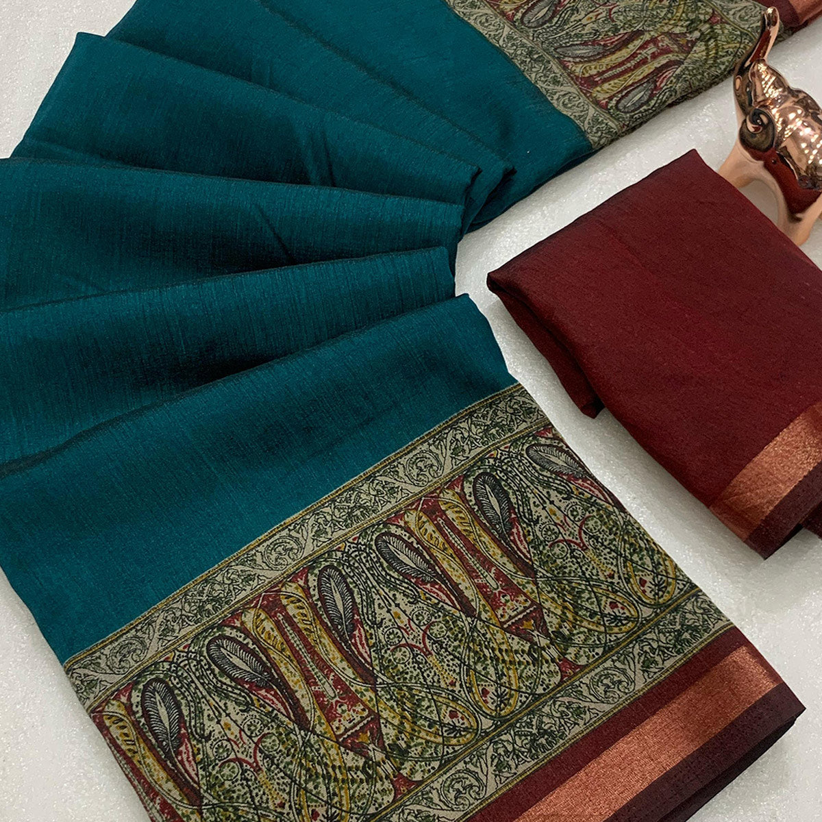 Teal Blue Solid Maheshwari Silk Blend Saree Adorned With Ajrakh Print & Two Tone Finish