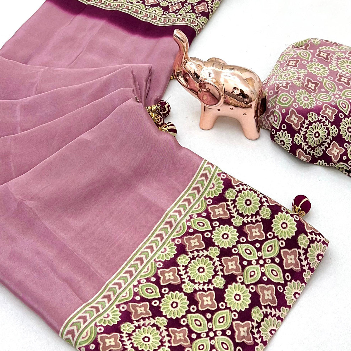 Dusty Rose Pink Solid Satin Saree Featuring Bold Ajrakh Print and Tassel Accented Pallu