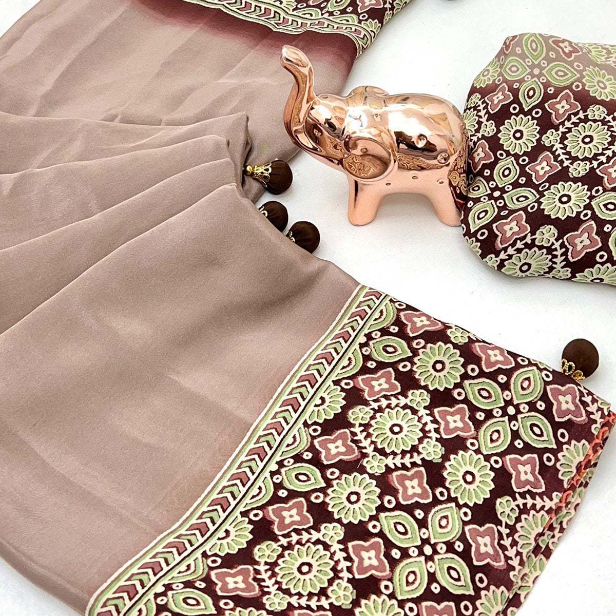 Taupe Solid Satin Saree Featuring Bold Ajrakh Print and Tassel Accented Pallu