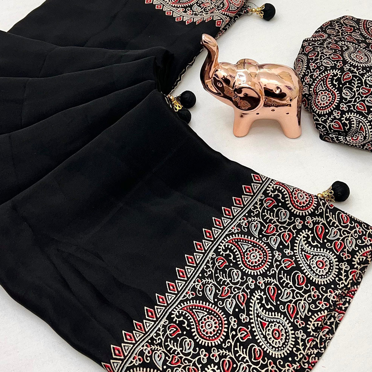 Black Satin Saree In Ajrakh Floral Print With Tassel Adorned Pallu
