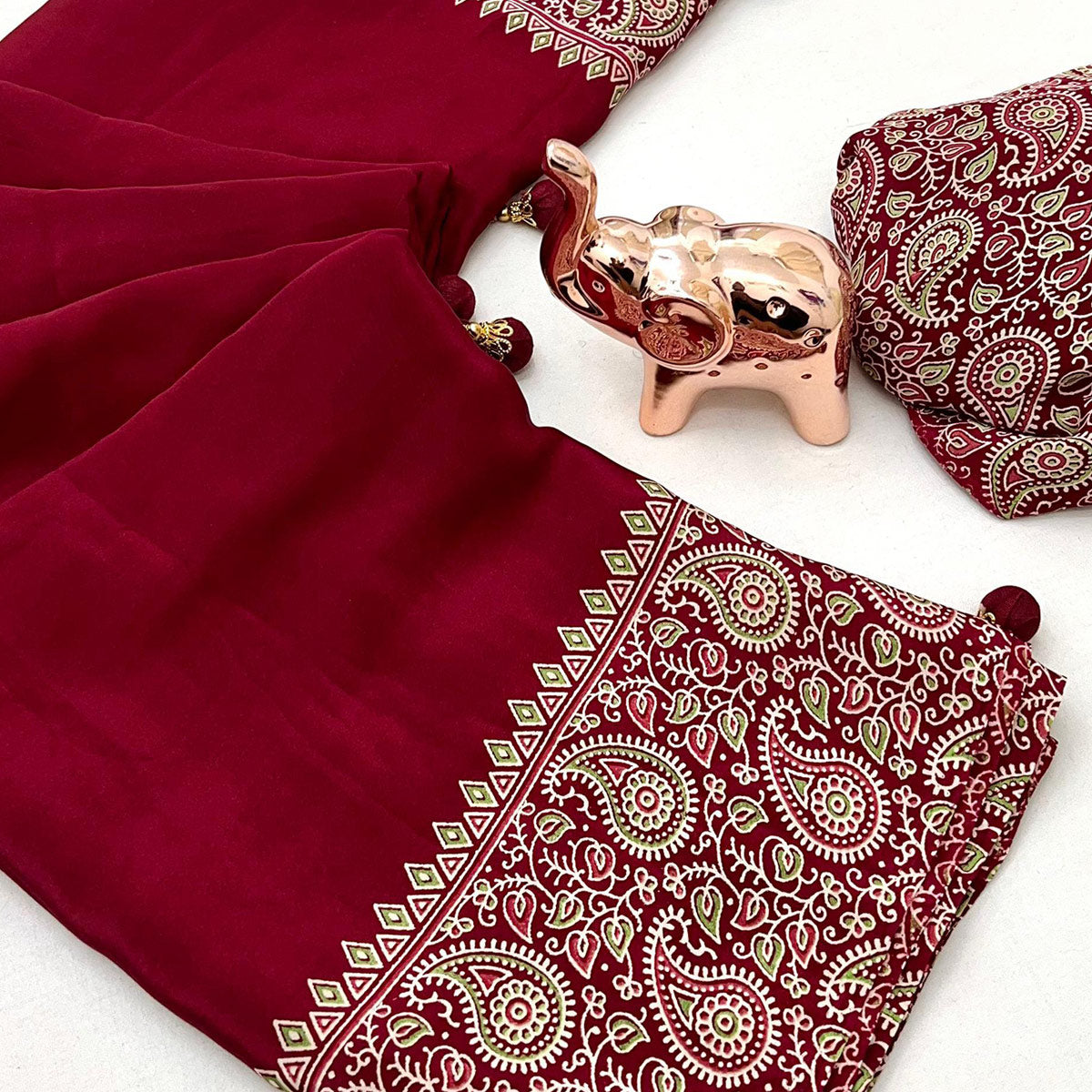 Maroon Satin Saree In Ajrakh Floral Print With Tassel Adorned Pallu
