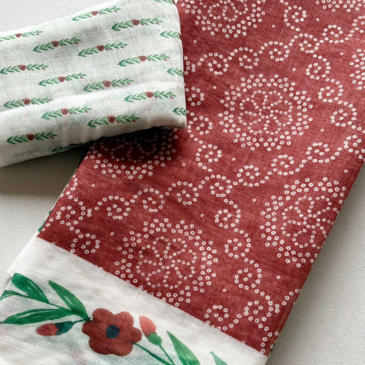 Chic Rust Linen Saree Featuring Bandhani & Floral Digital Prints