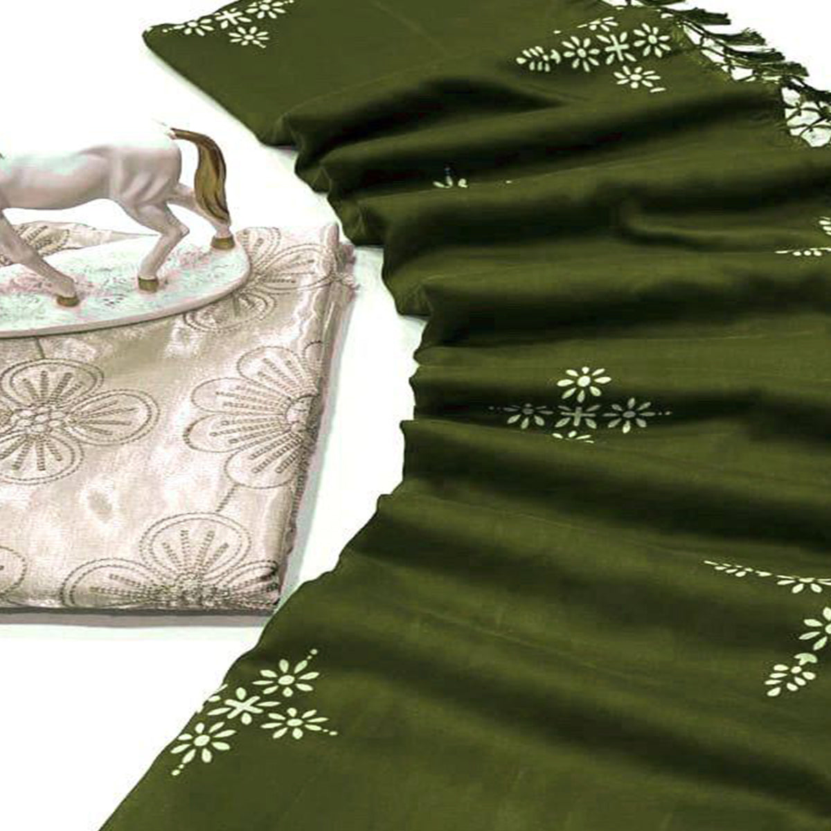 Mehendi Green Muslin Cotton Silk Saree Adorned With Delicate Floral Prints & Playful Tassels