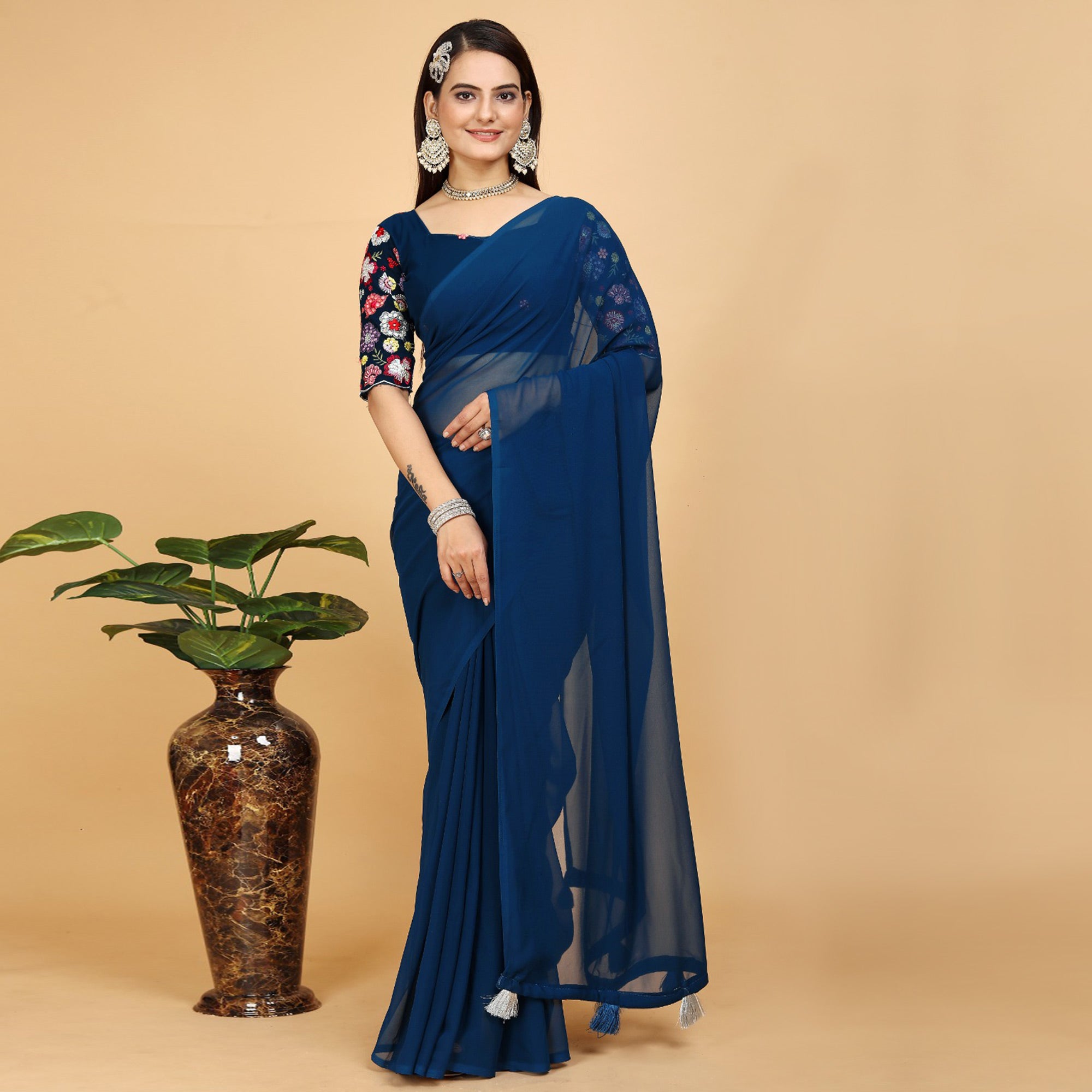 Blue Solid Georgette Saree With Tassels