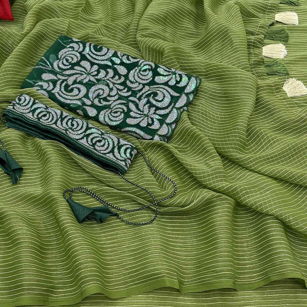 Green Woven Chiffon Saree with Tassels