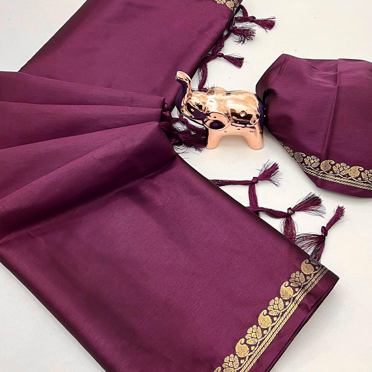 Classic Wine Solid Weaving Mysore Silk Saree Accented With Floral Border & Tassel Pallu