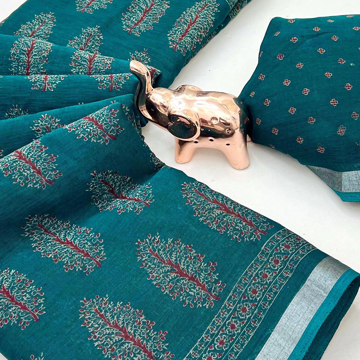 Classic Teal Linen Cotton Saree Featuring Floral Ajrakh Print & Rich Silver Zari Border