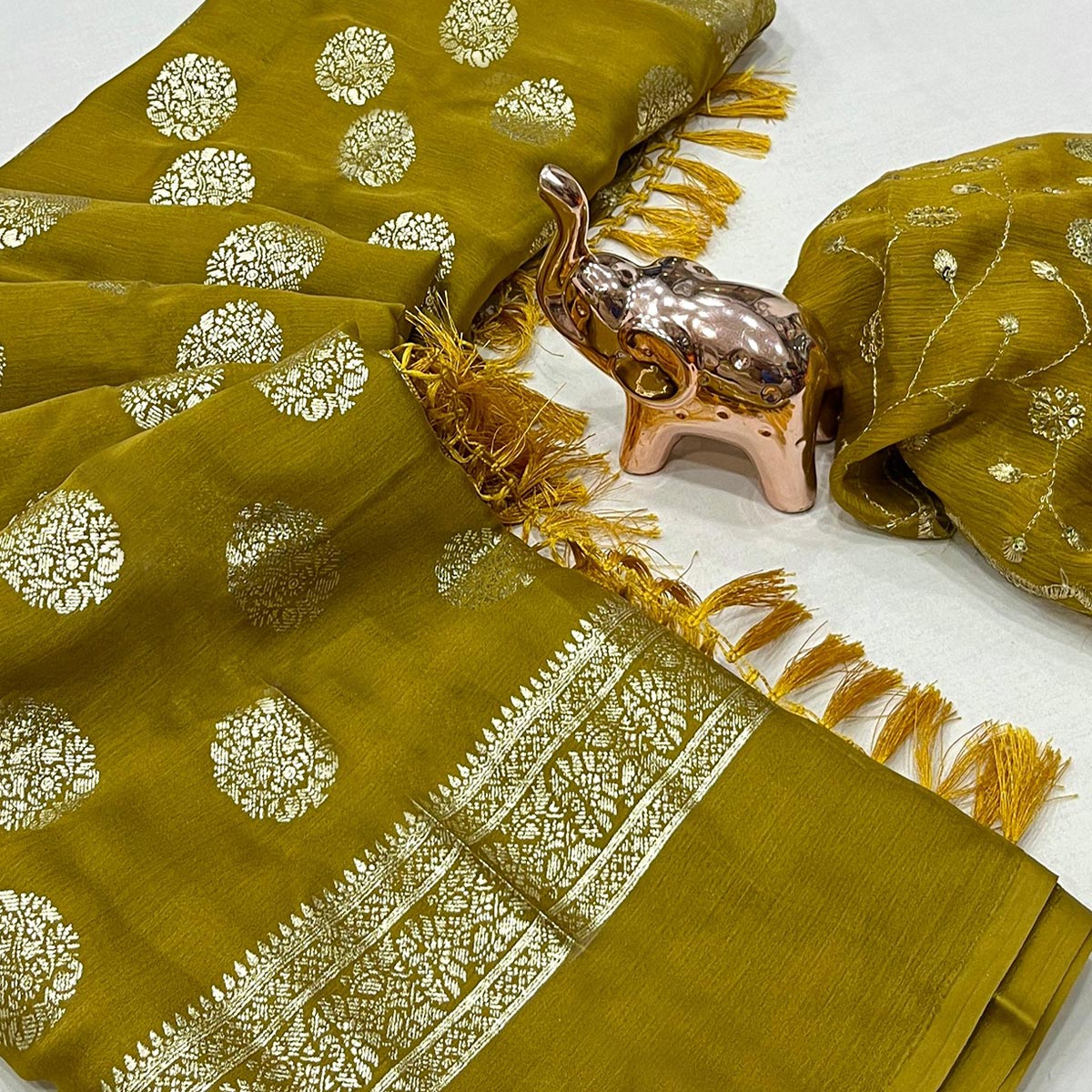 Elegant Mustard Foil Floral Printed Georgette Saree With Tassel Detailing Pallu