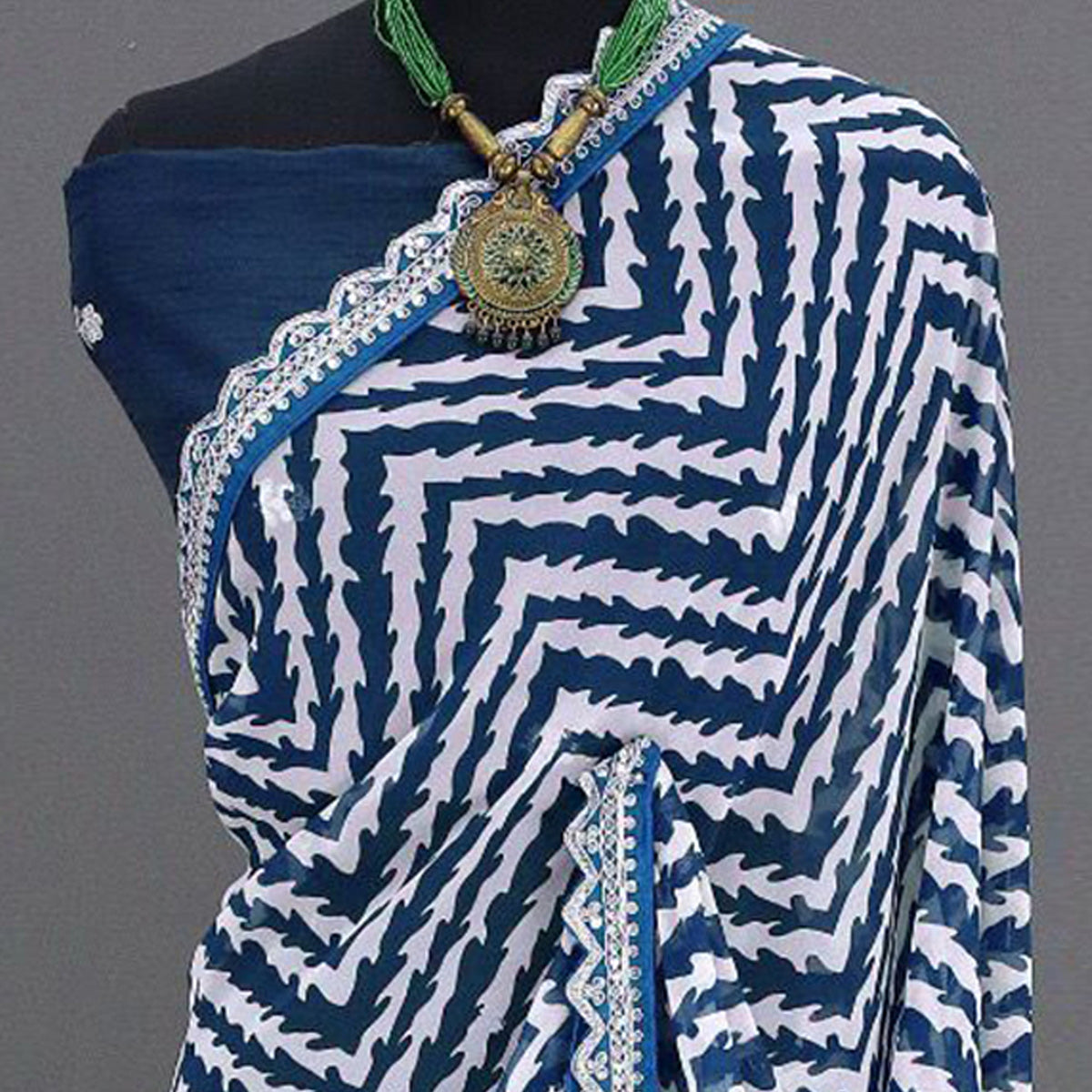 Blue Zig Zag Printed Georgette Saree With Sequins Embroidered Border