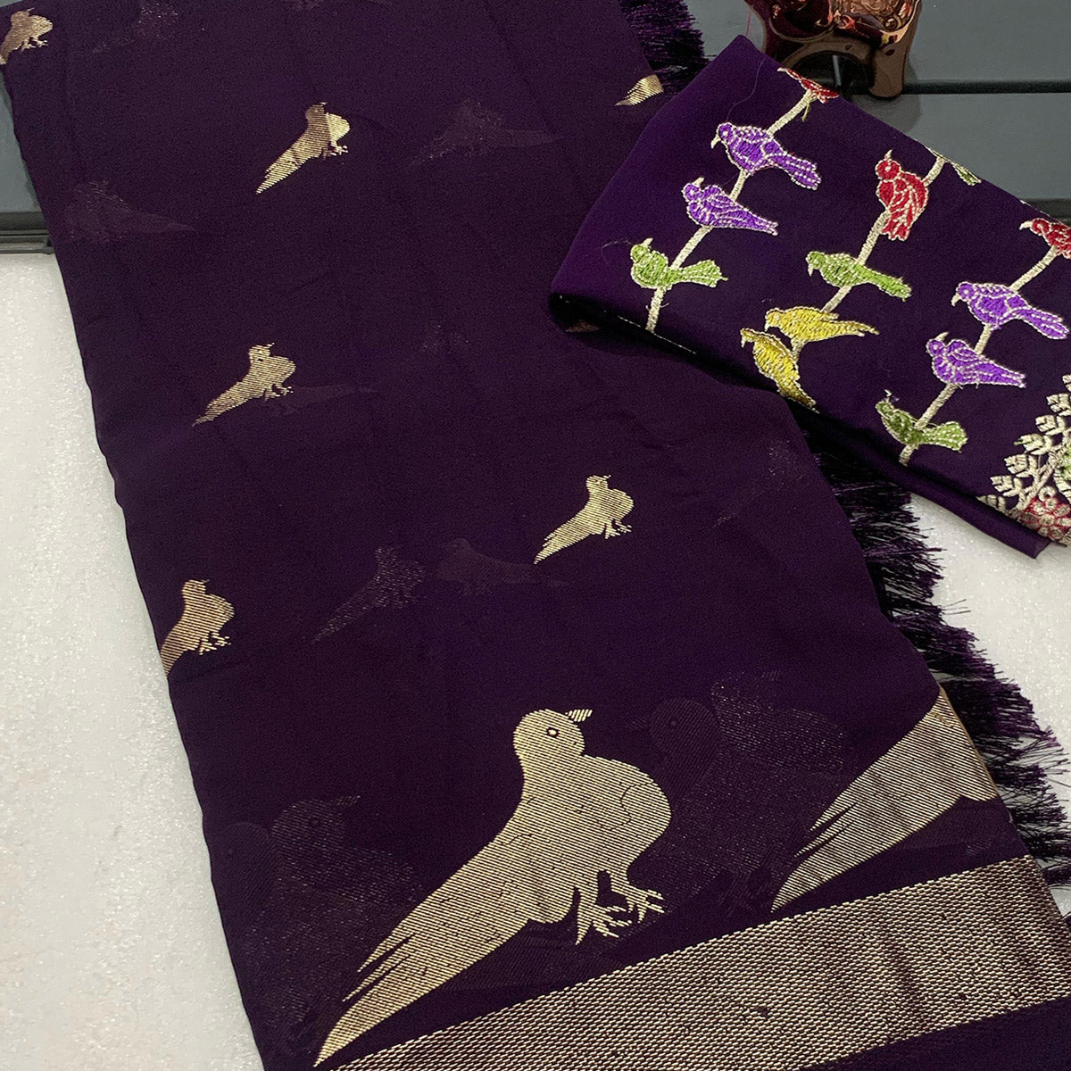Purple Georgette Saree Adorned With Elegant Bird Embroidery