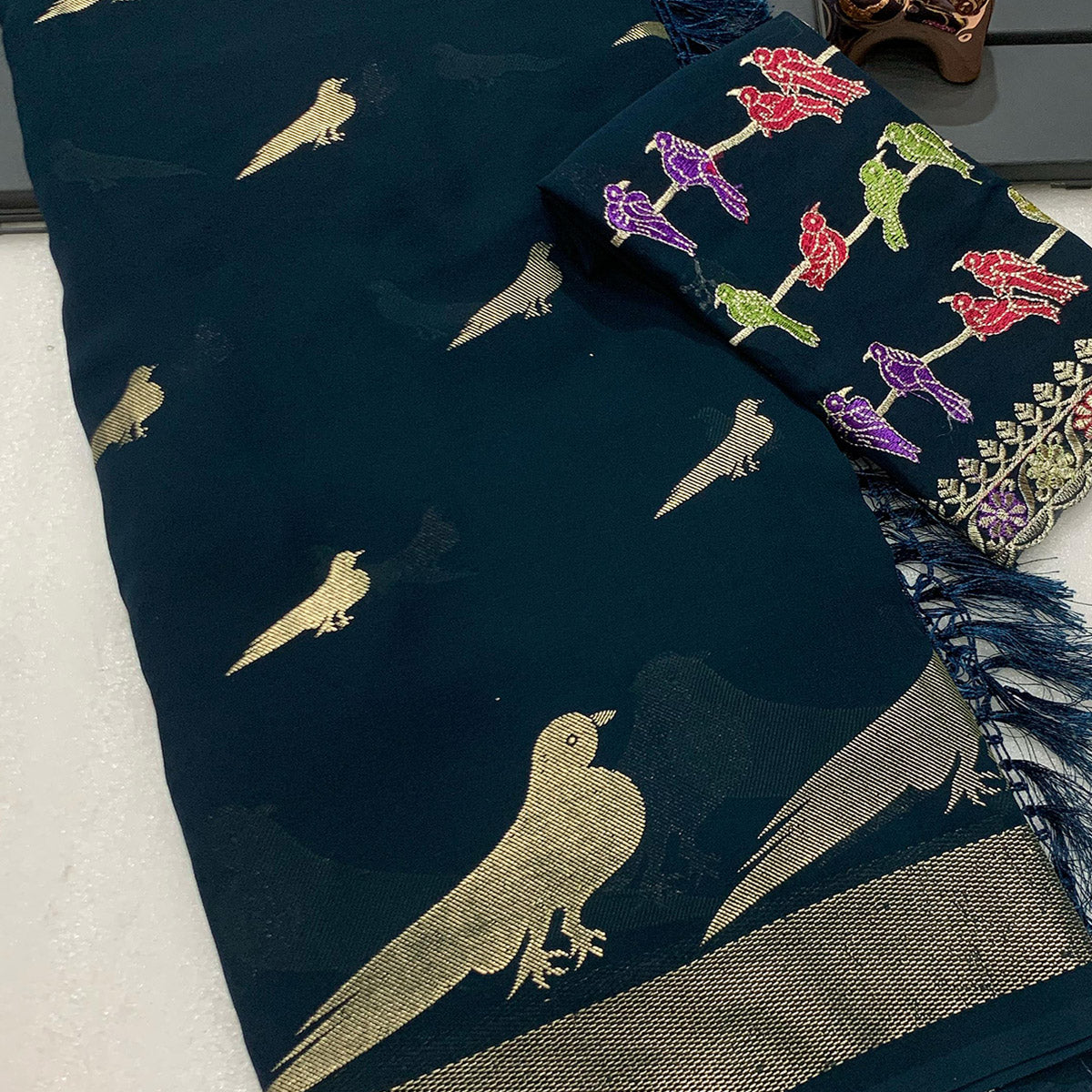 Teal Georgette Saree Adorned With Elegant Bird Embroidery