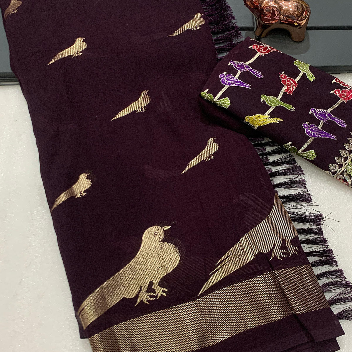 Wine Georgette Saree Adorned With Elegant Bird Embroidery