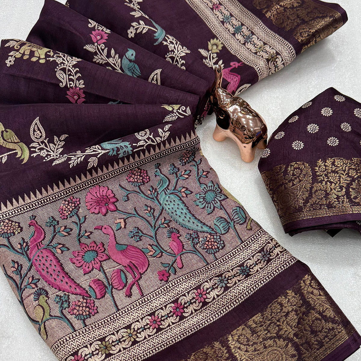 Designer Wine Dola Silk Saree Featuring Intricate Floral Zari Weaving