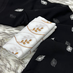 Black Embroidered Georgette Saree With Tassels