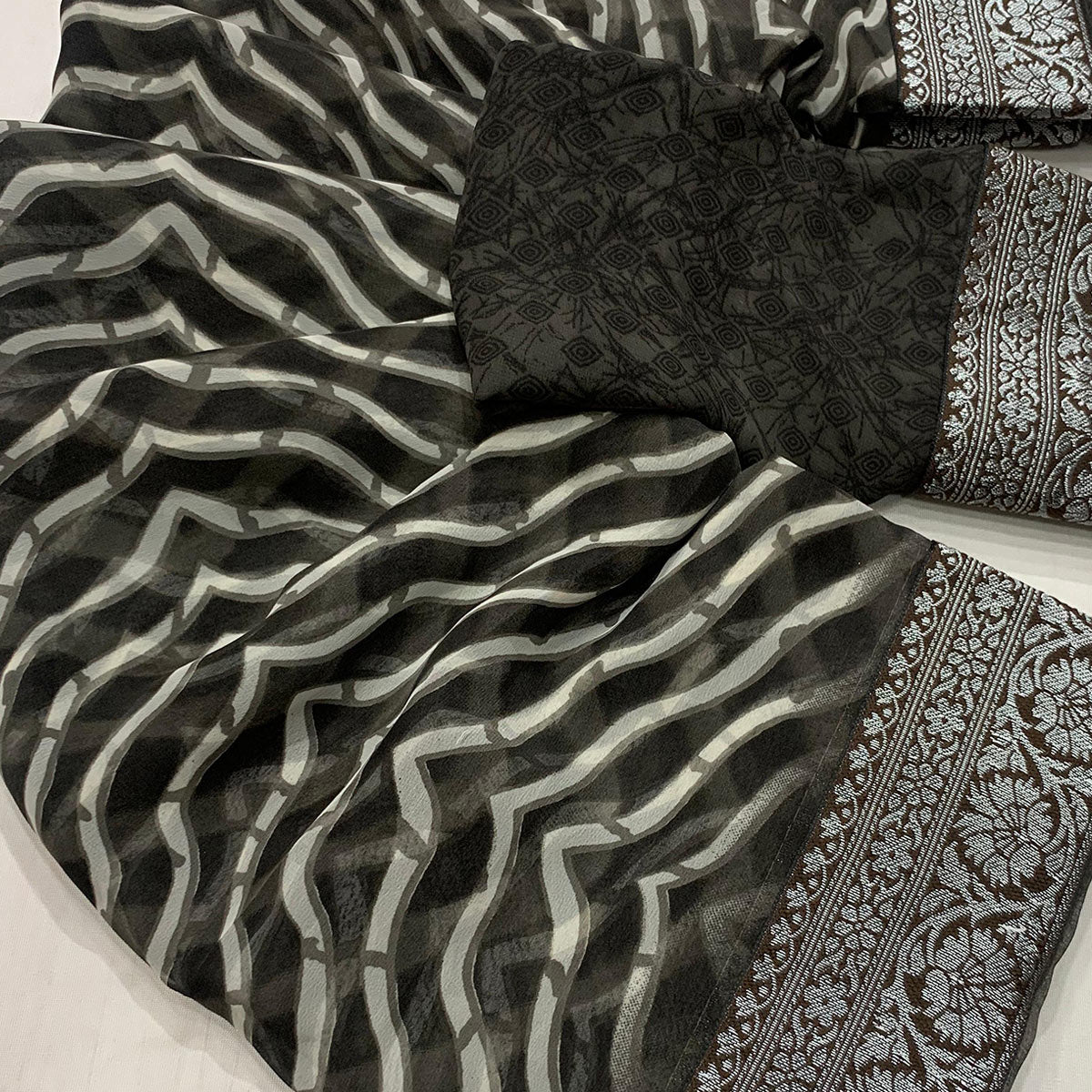 Black Leheriya Printed Georgette Saree With Woven Border