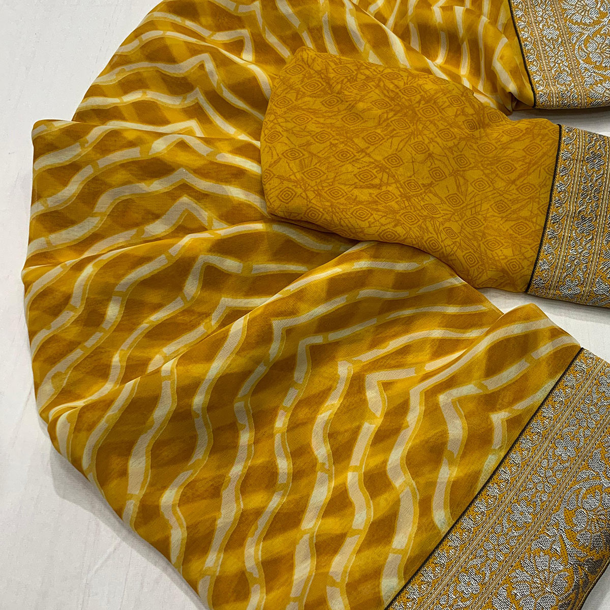 Mustard Leheriya Printed Georgette Saree With Woven Border