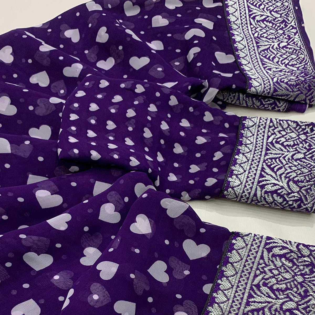 Purple Heart Printed Georgette Saree With Woven Border