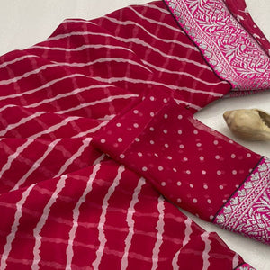Pink Leheriya Printed Georgette Saree With Woven Border