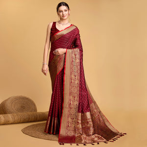 Maroon Woven Pure Silk Saree With Tassels