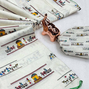 Graceful Off White Dola Silk Saree Highlighted with Handcrafted Warli Motifs