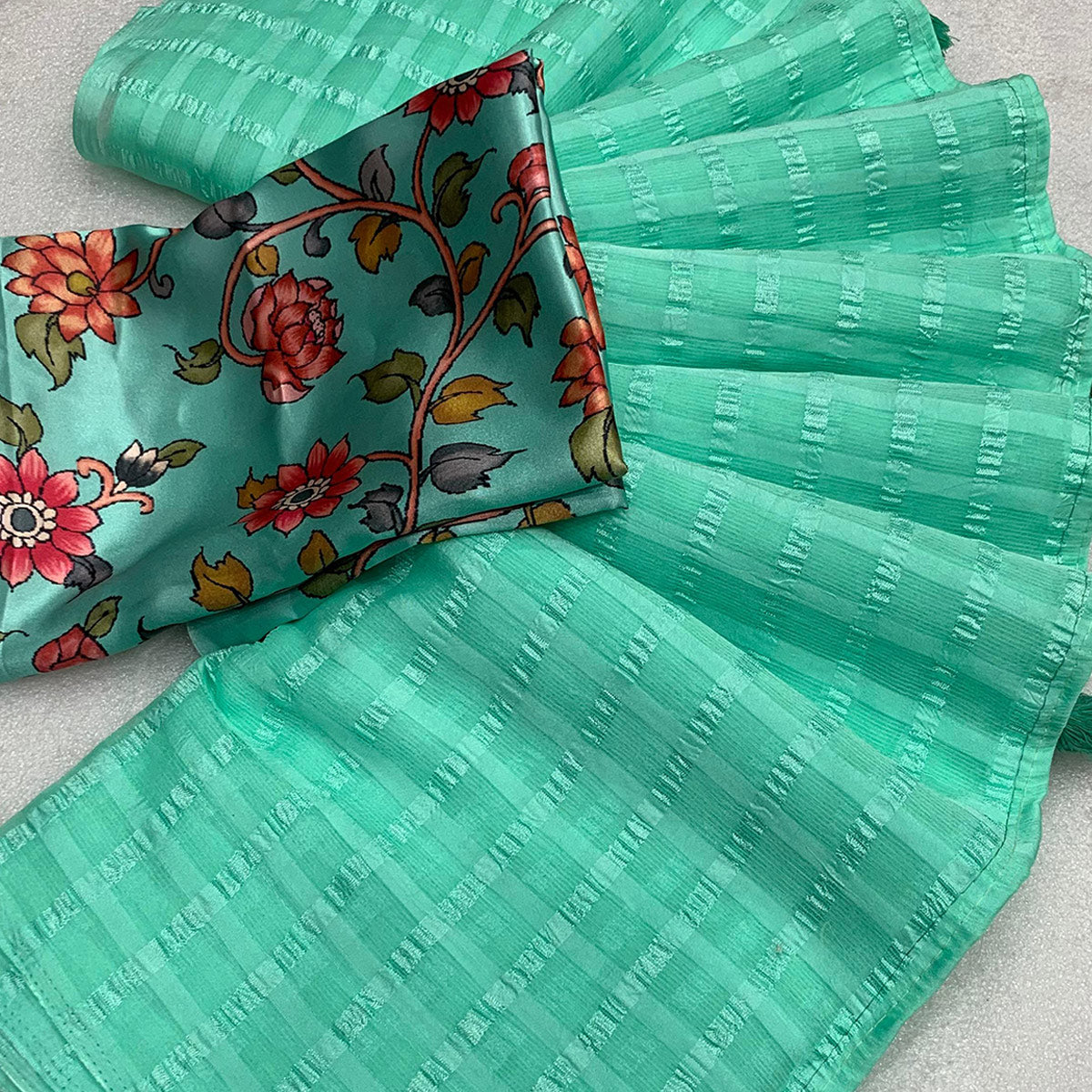 Turquoise Woven Chiffon Wrinkle Saree With Tassels
