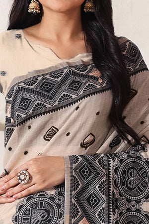 Timeless Cream & Black Saree In Linen Cotton With Rich Zari Weaving And Tassel Pallu