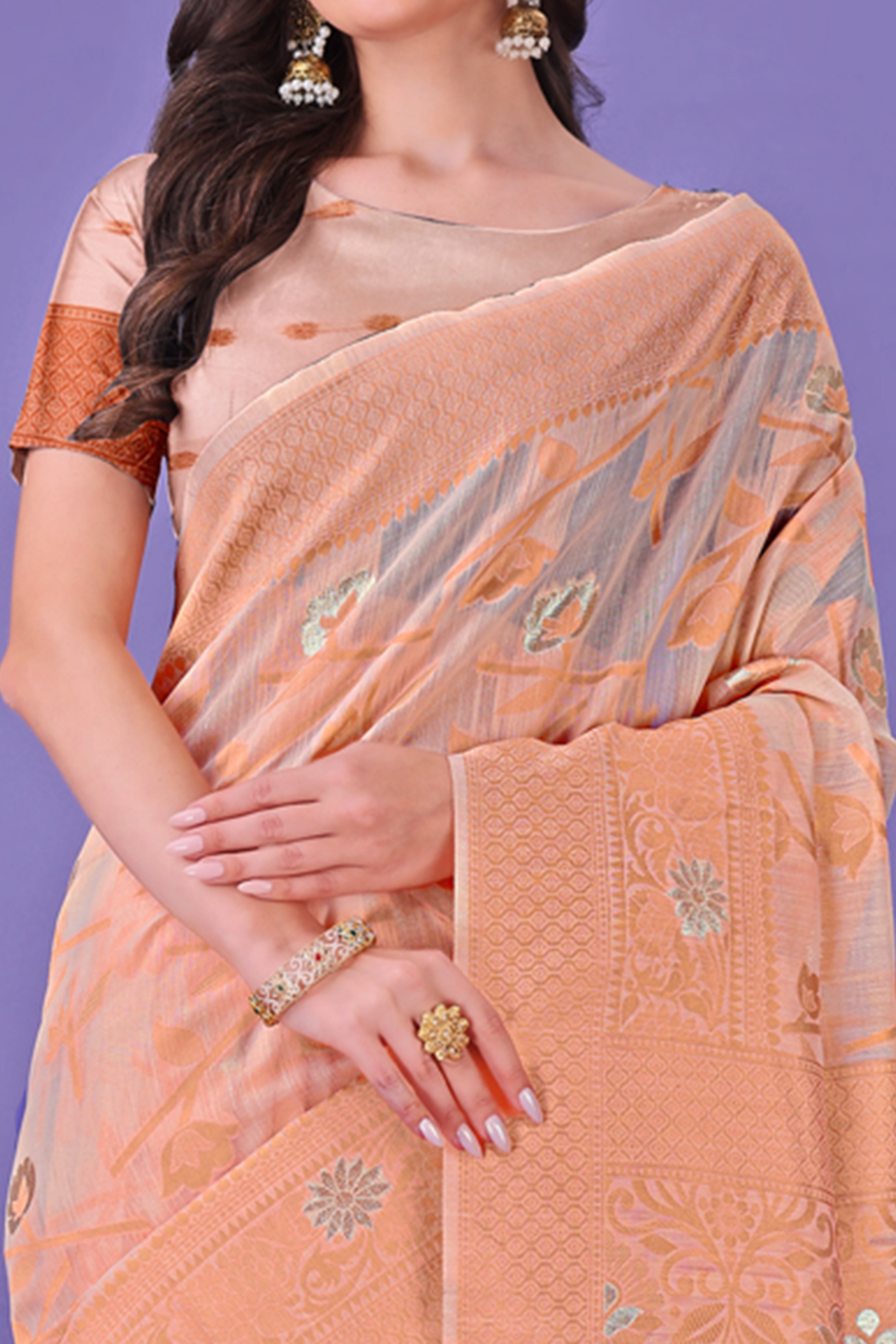 Peach Floral Pattern Woven Saree in a Soft Cotton Blend with Tasseled Edges