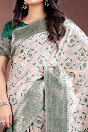 Refreshing Green Traditional Ikkat Style Zari Weaving Cotton Blend Saree with Harmonious Tassels