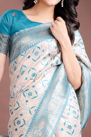 Brilliant Turquoise Traditional Ikkat Style Zari Weaving Cotton Blend Saree with Stunning Tassel Accents