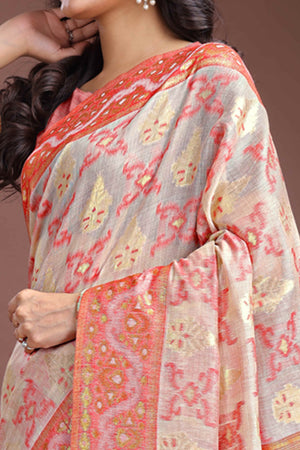 Exquisite Peach Traditional Ikkat Style Zari Weaving Cotton Blend Saree with Delicate Tassels