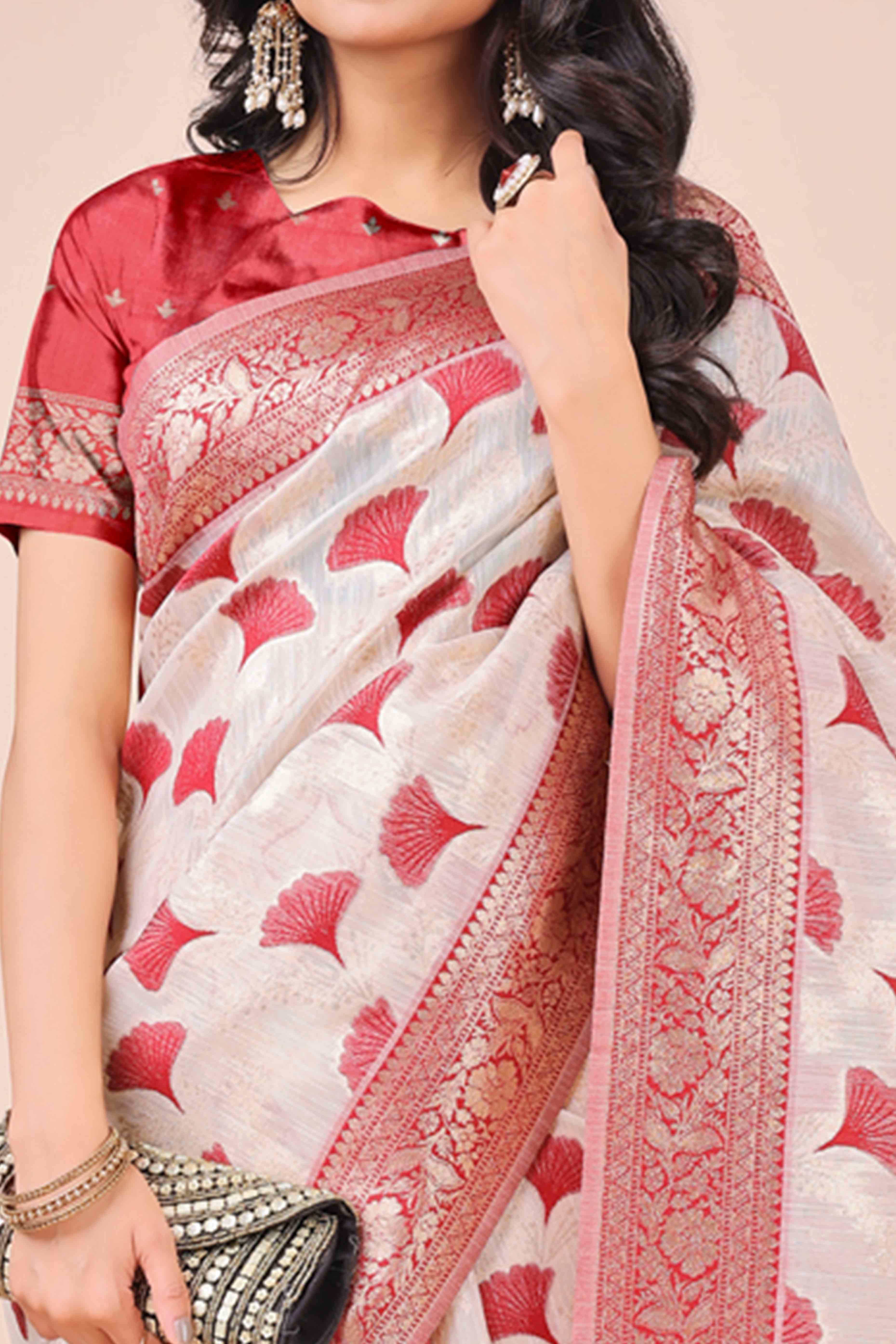 Maroon Saree In Linen Cotton With Beautiful Floral Woven Patterns & a Tassel