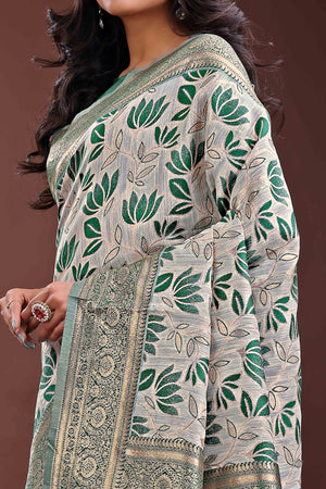 Green Linen Cotton Saree Featuring Graceful Floral Patterns in Zari Weave