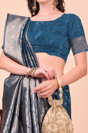 Morpich Blue Saree In Lichi Silk Blend With Floral Zari Weaving & Delicate Tassel Border