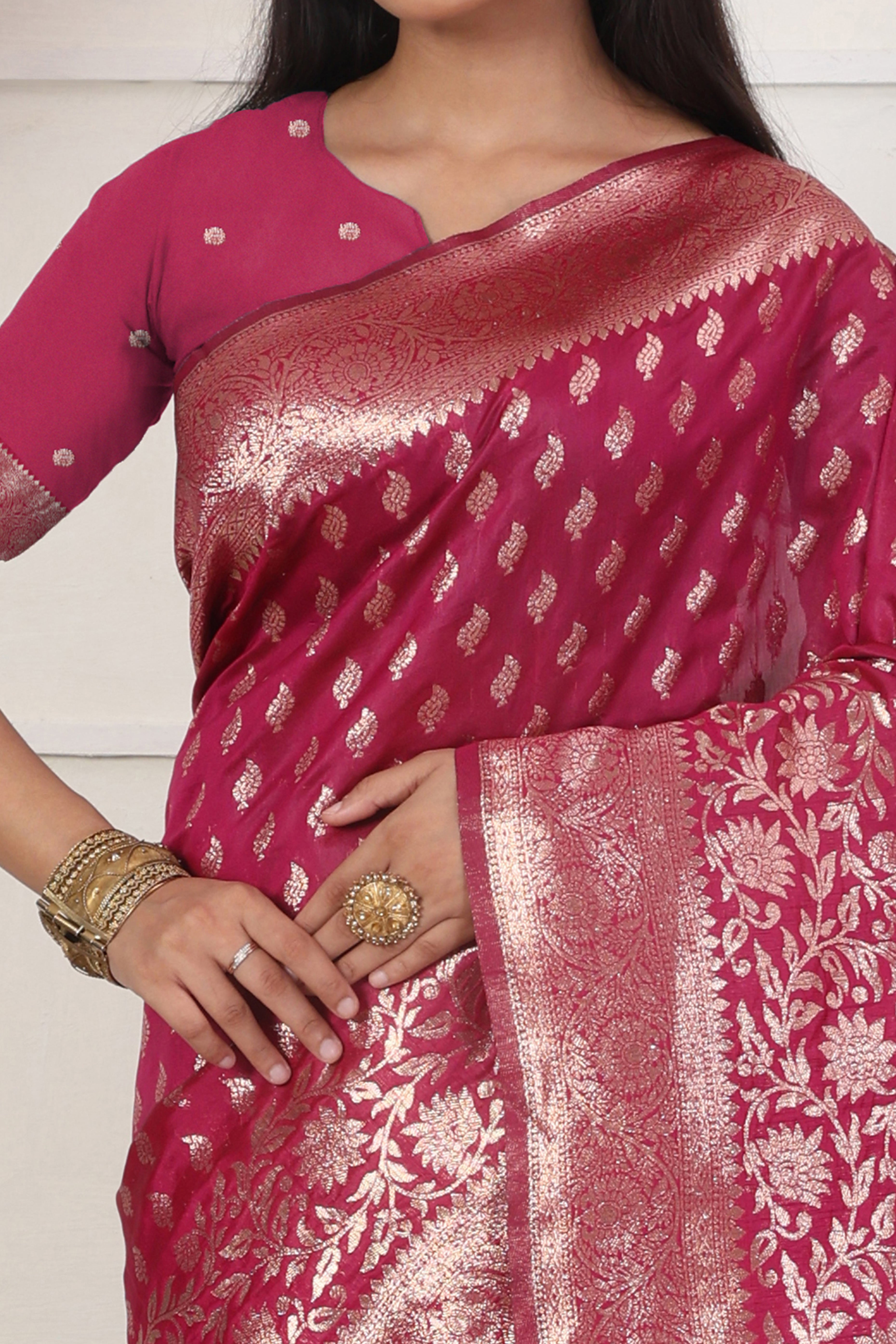 Pink Traditional Lichi Silk Blend Saree Enhanced With Floral Zari Weaving & Tassel Pallu