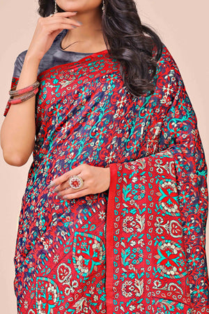 Red & Blue Floral Woven Cotton Blend Saree With A Breezy Tassel Finish