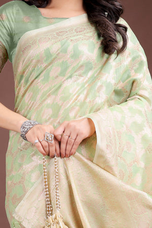 Light Green Linen Cotton Saree with Lustrous Zari Borders and Elegant Tassel Accents