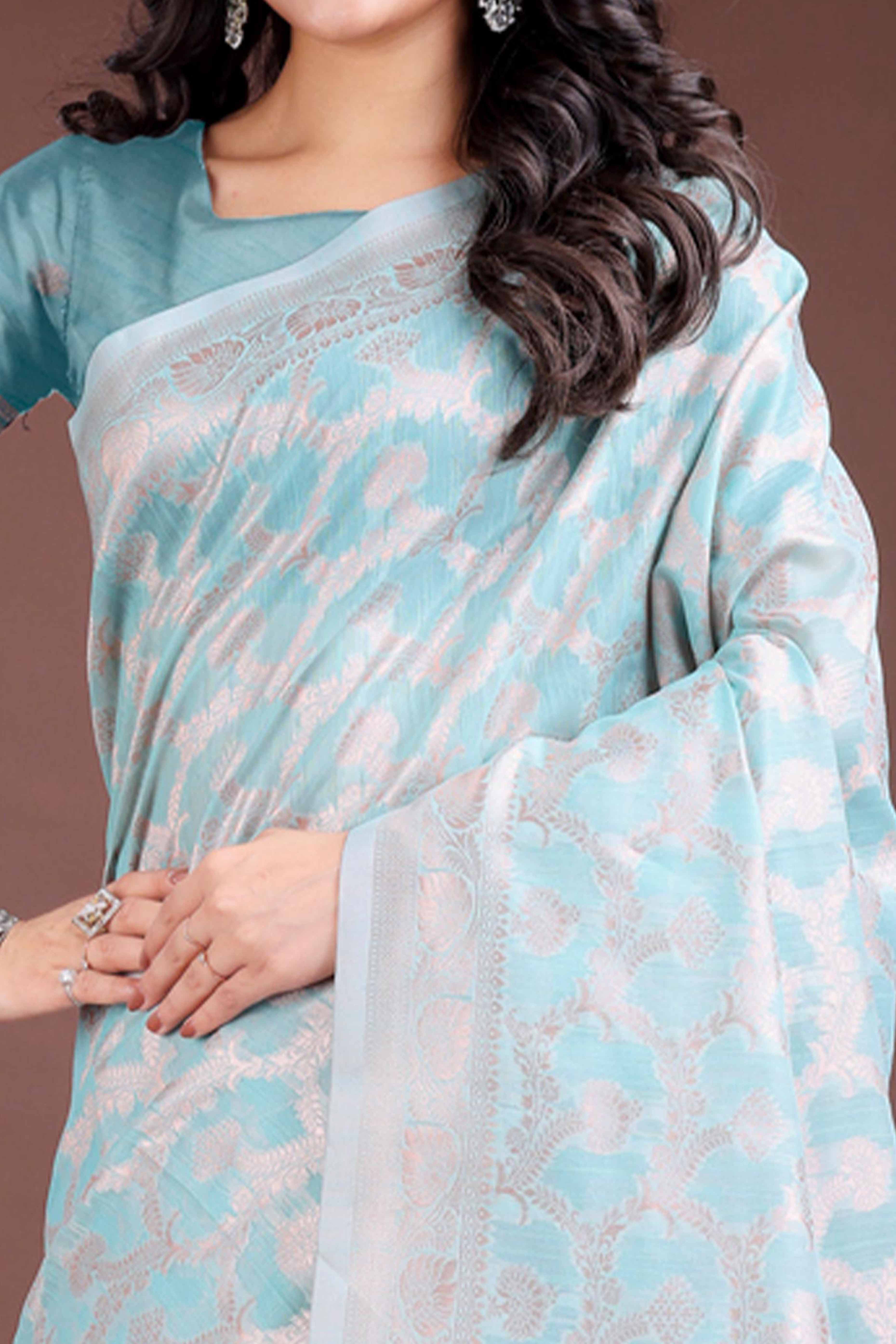 Sea Green Linen Cotton Saree with Lustrous Zari Borders and Elegant Tassel Accents