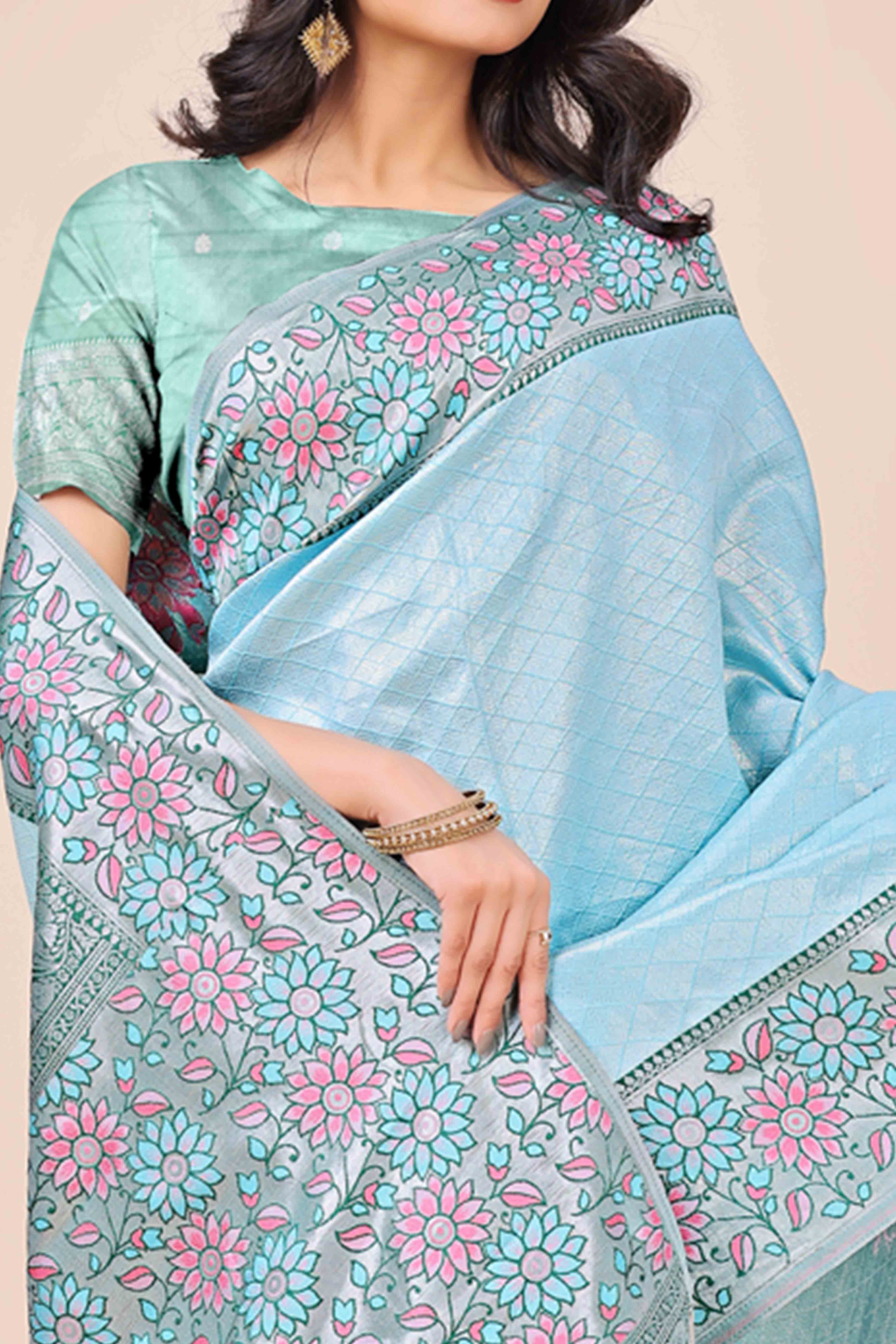 Light Blue Lichi Silk Blend Saree With Exquisite Floral Weaving & Graceful Tassel Details