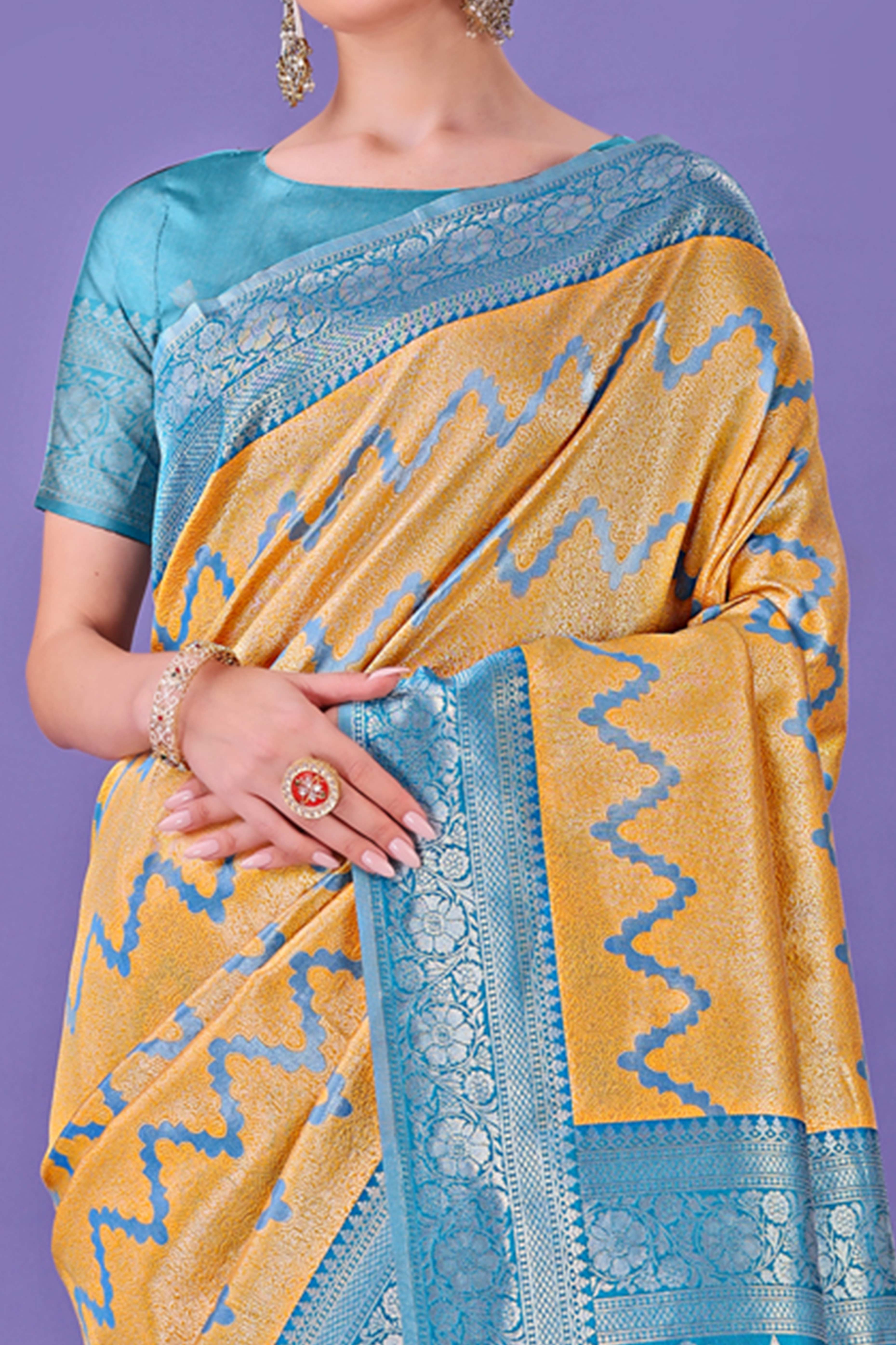 Yellow Lichi Cotton Silk Saree Adorned With Floral Zari Weave & Tassels