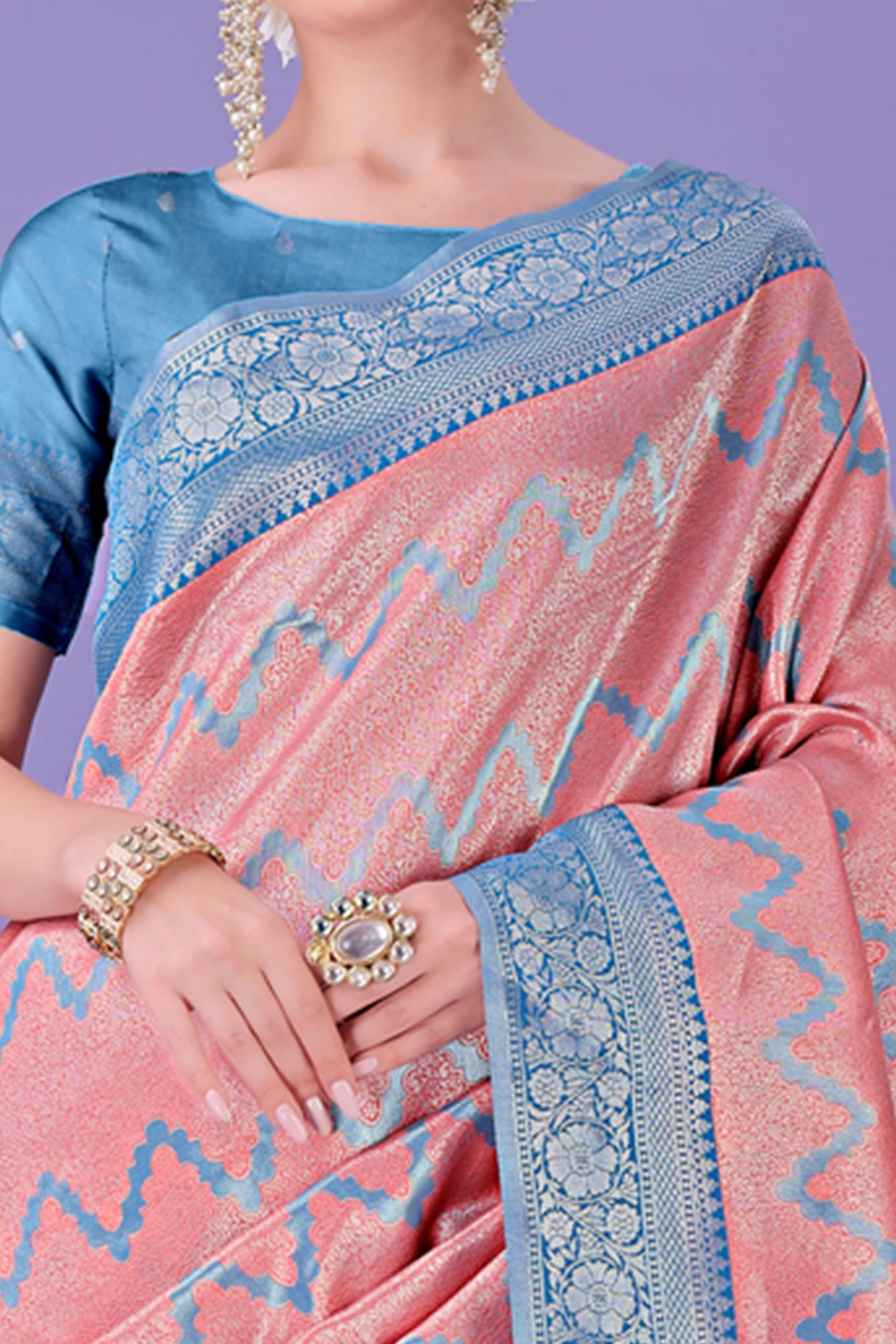 Peach Lichi Cotton Silk Saree Adorned With Floral Zari Weave & Tassels