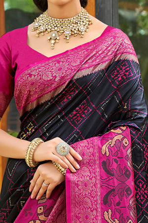 Graceful Black Pochampally Silk Blend Saree Adorned With Floral Weaving & Stylish Tassel Pallu