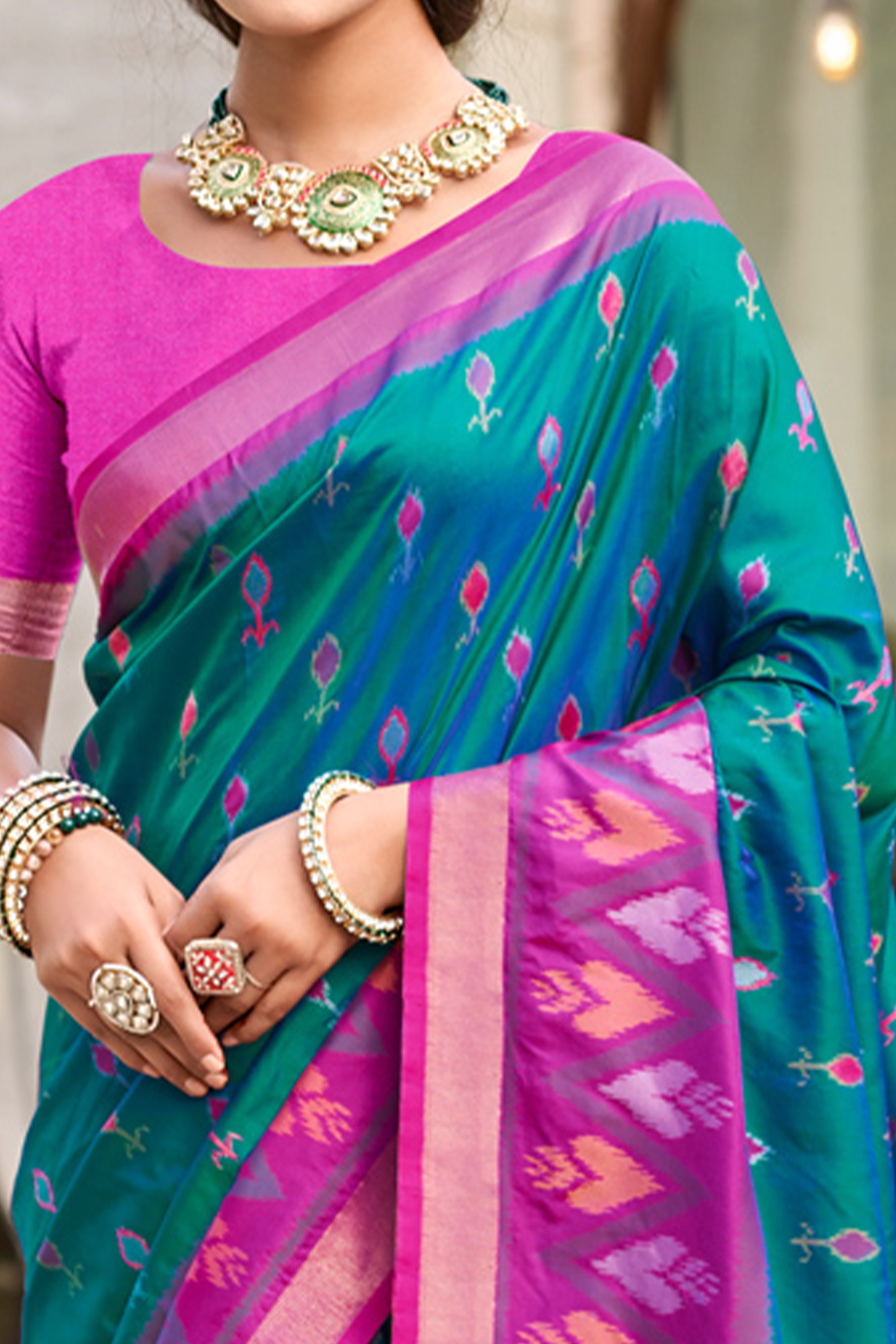 Elegant Morpich Blue Pochampally Ikkat Silk Blend Saree Featuring Intricate Weaving & Tassel Pallu