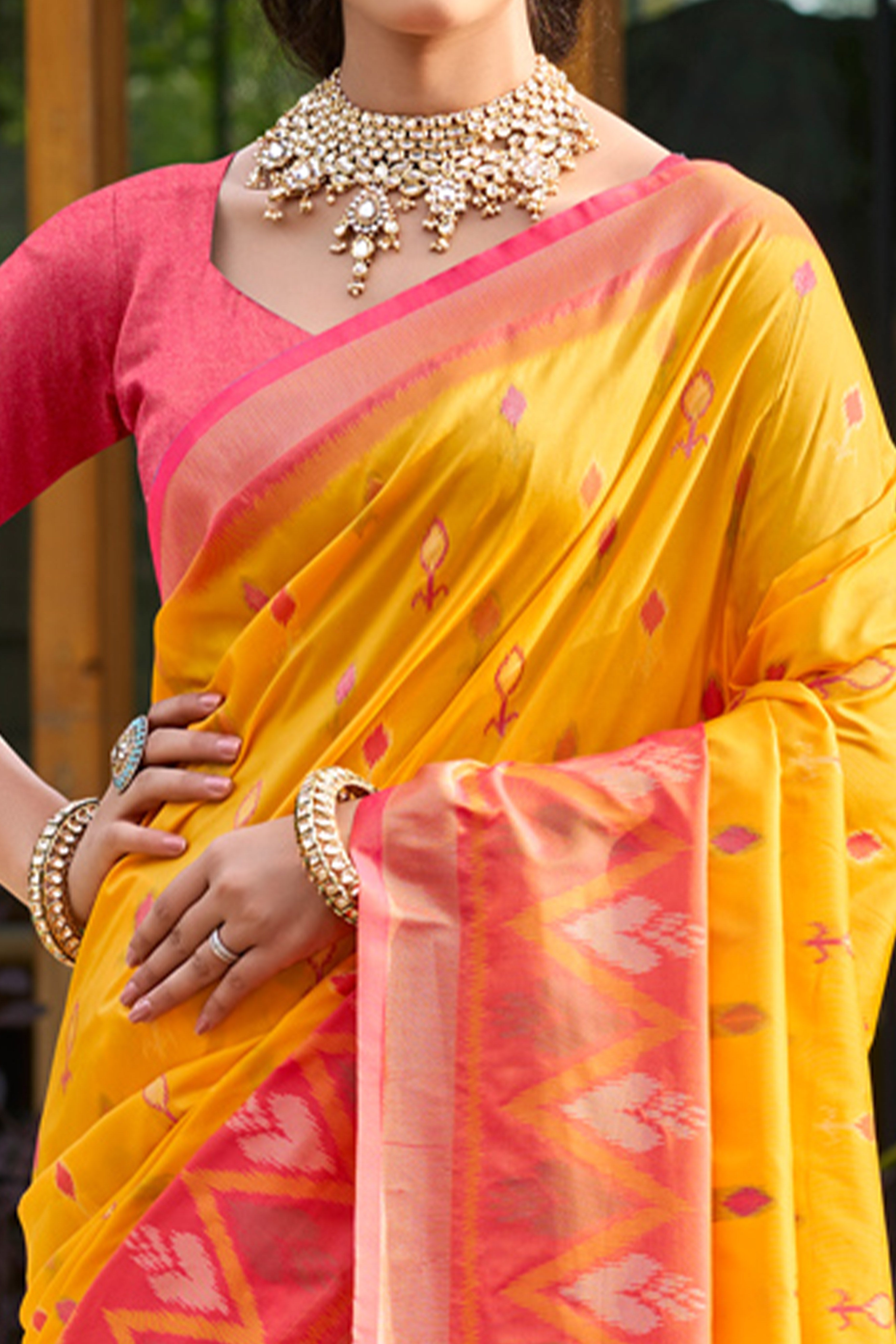 Elegant Yellow Pochampally Ikkat Silk Blend Saree Featuring Intricate Weaving & Tassel Pallu
