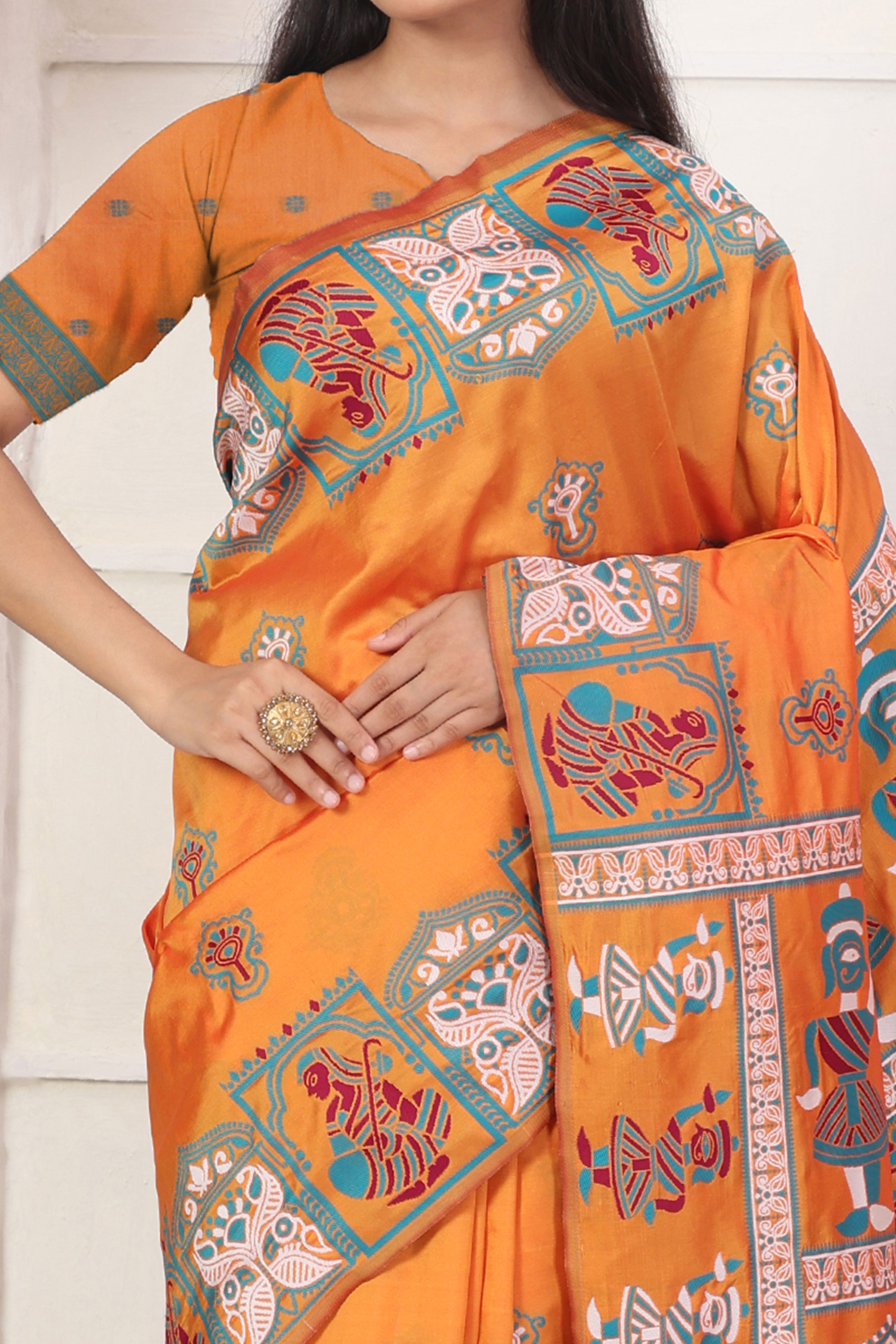 Orange Ethnic Madhubani Print Silk Blend Saree Enhanced With Tassel Pallu Accents