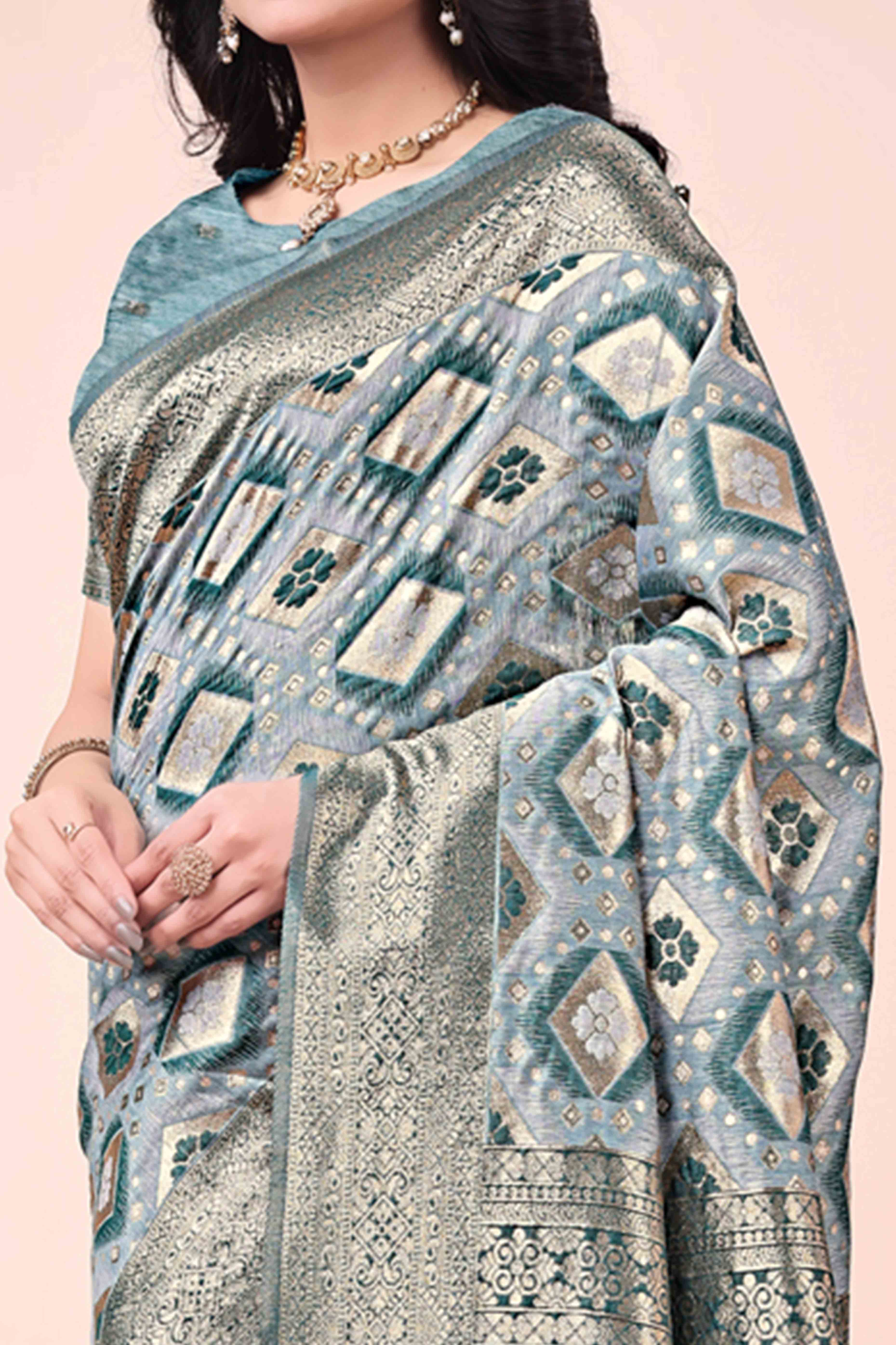 Floral Weaving On Green Cotton Blend Saree With Tassels