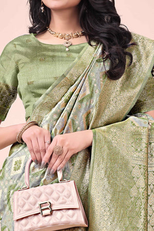 Floral Weaving On Mehendi Green Cotton Blend Saree With Tassels