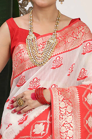 Chic White & Red  Saree In Linen Cotton Flaunting Traditional Zari Weaving And A Tasselled Edge