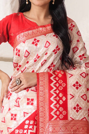 Graceful White & Red Saree In Linen Cotton With Fine Zari Weaving And Flowing Tassel Details